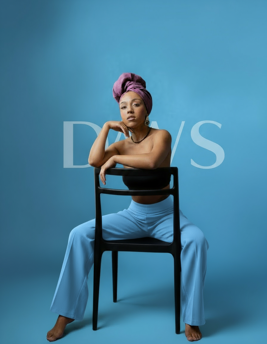 Woman with a purple headwrap on a purple background with text overlay